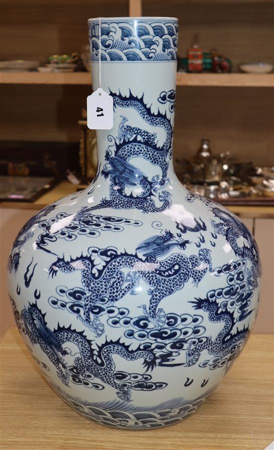A Chinese blue and white dragon vase height 58cm
